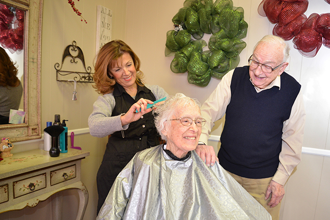 Lois and Preston Atwood get ready for Lois’ 94th birthday party with
				the help of their hairstylist LuAnn Dutra in East Providence, R.I.