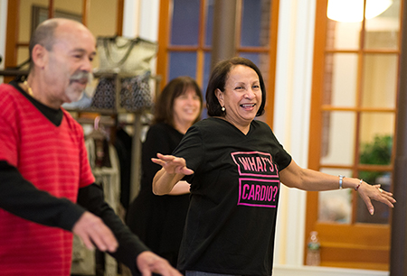 Adrian and Ursula Santiago get a little cardio in the Monday morning
Strength and Toning class at the center.